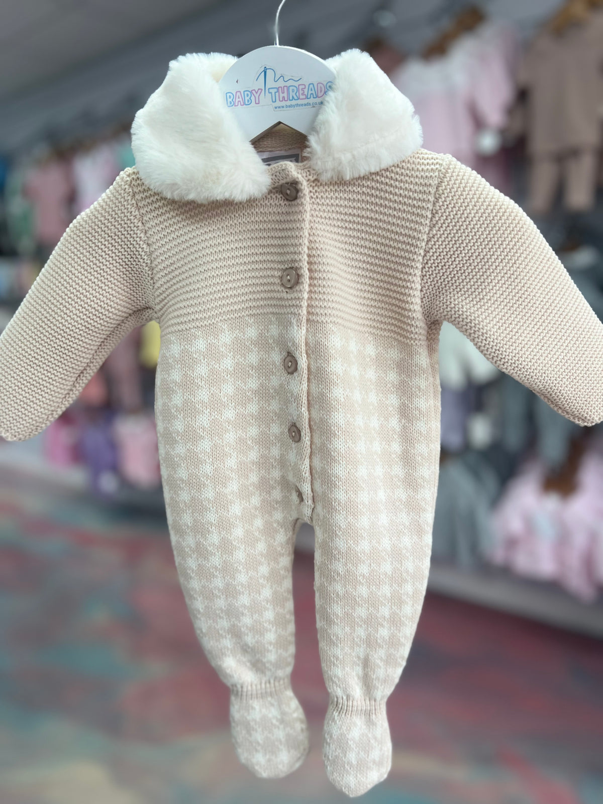 Fur trimmed knitted pramsuit