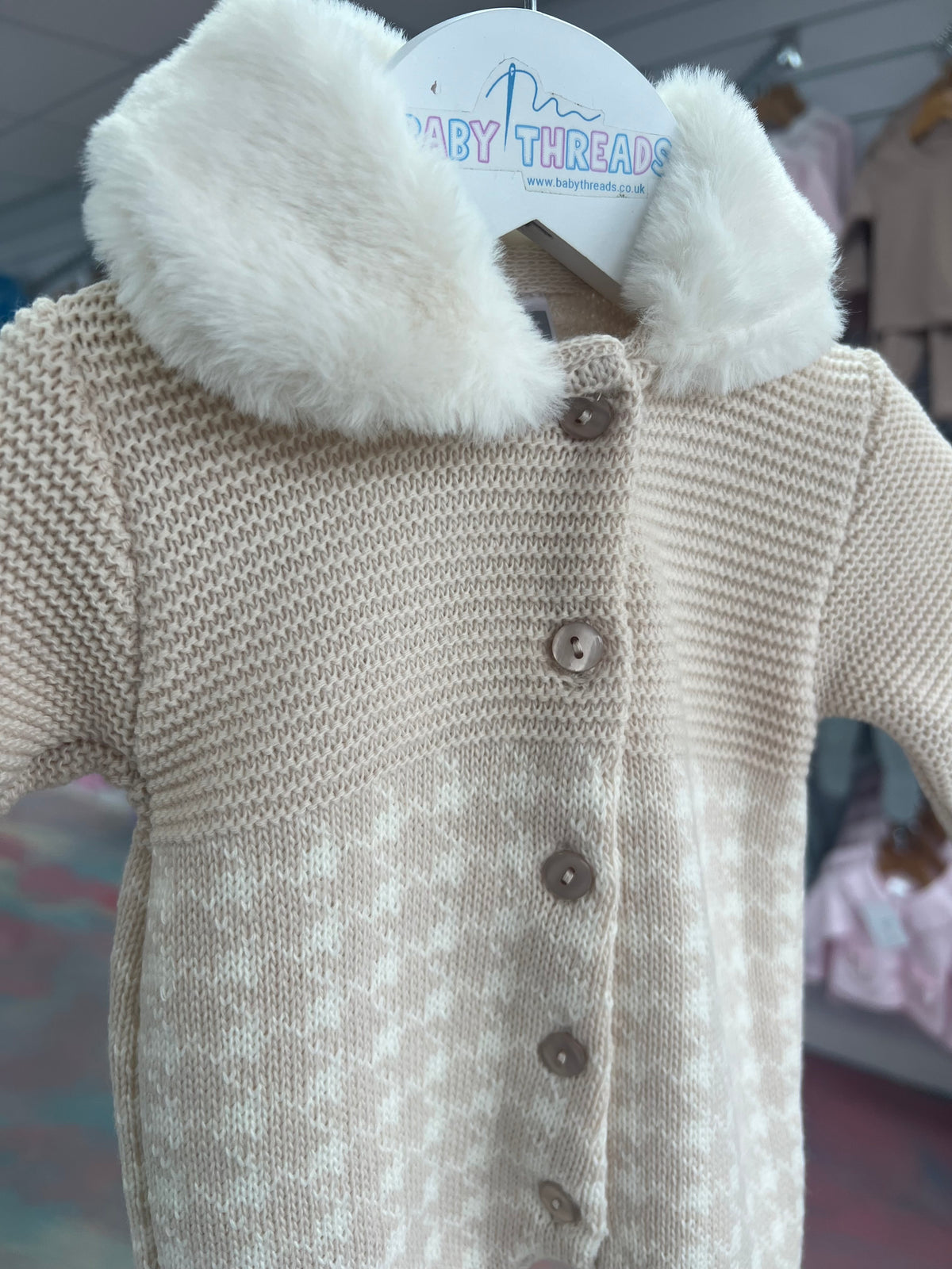 Fur trimmed knitted pramsuit